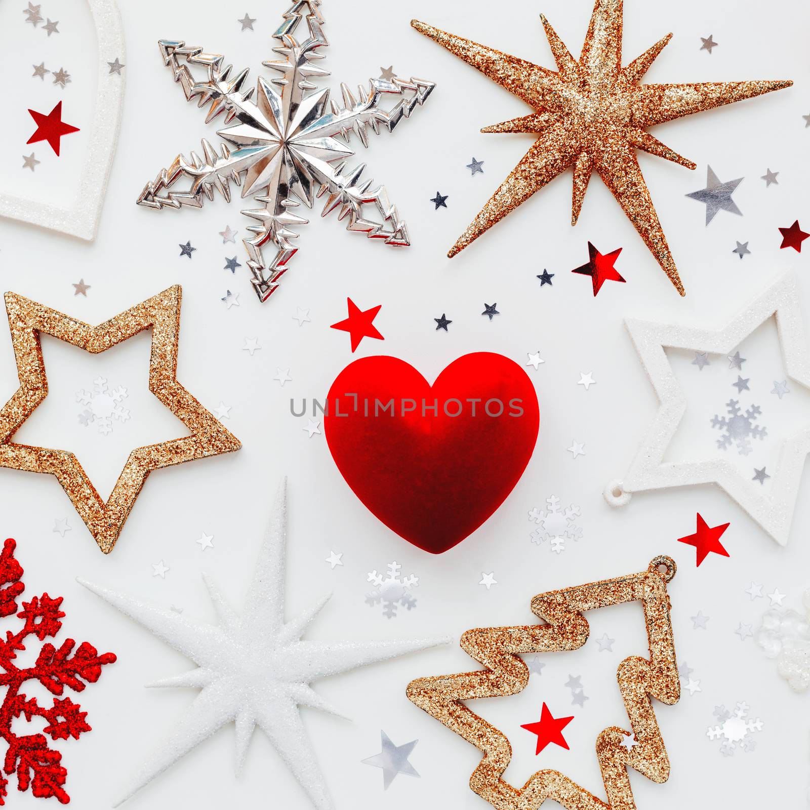 Christmas and New Year holiday background with decorations and red gift heart box. Top view, flat lay.