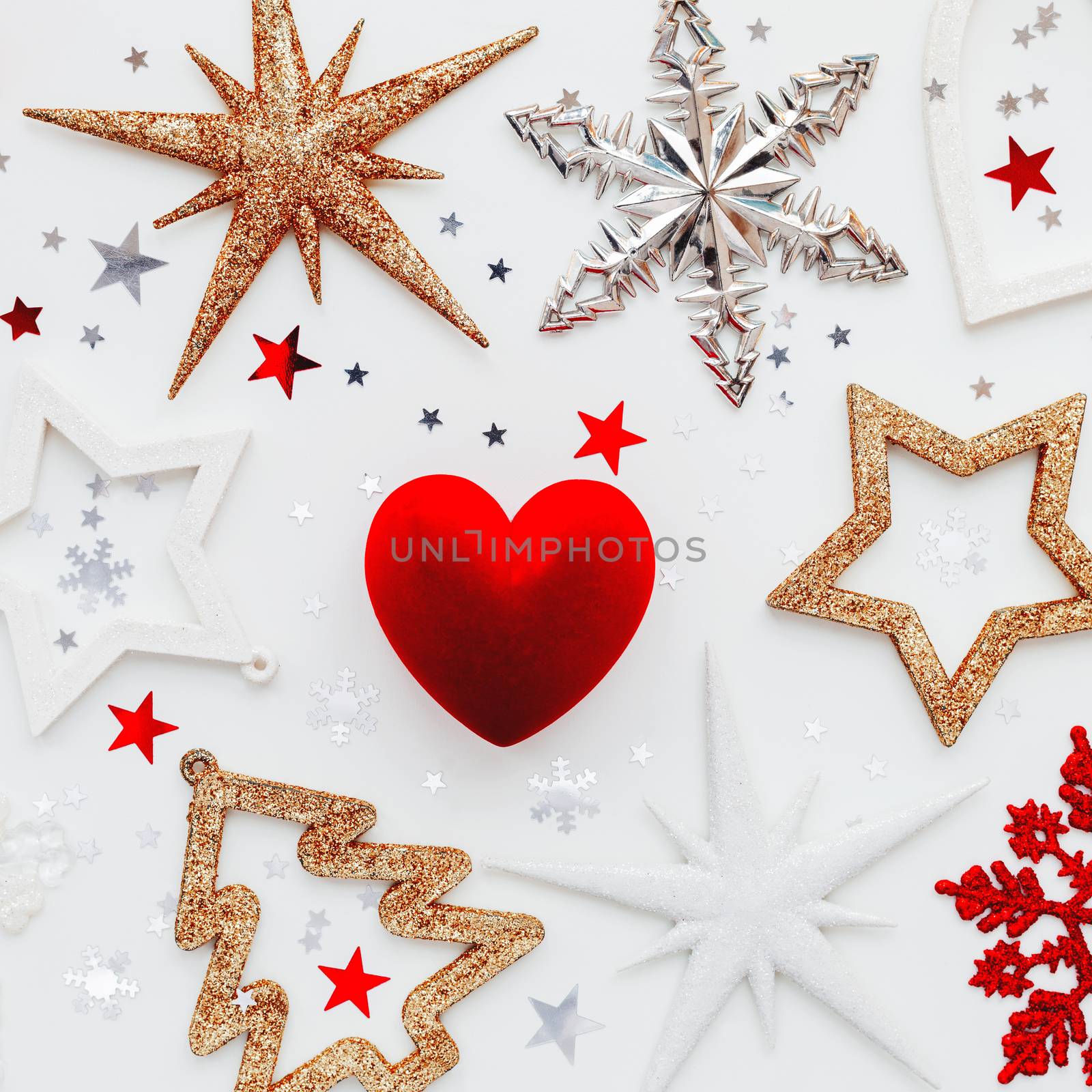 Christmas and New Year holiday background with decorations and red gift heart box. Top view, flat lay.