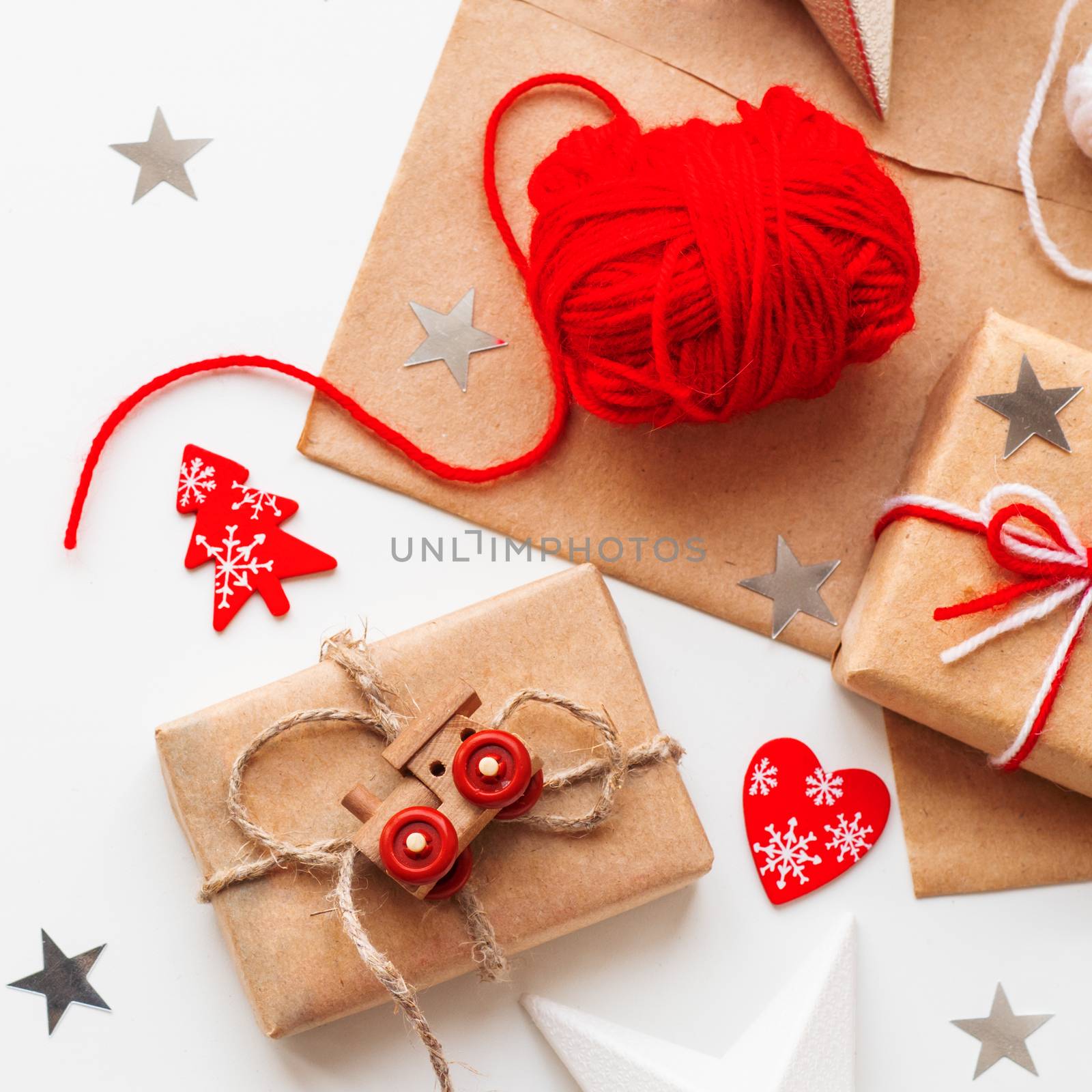 Christmas and New Year DIY presents in craft paper. Holiday gift by aksenovko