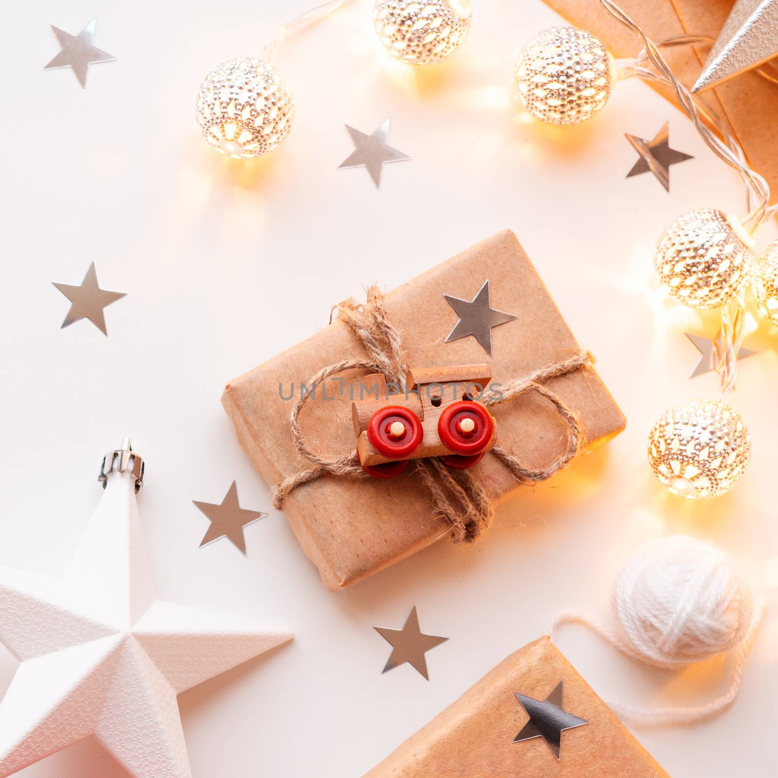 Christmas and New Year wrapped DIY presents in craft paper. Gift by aksenovko