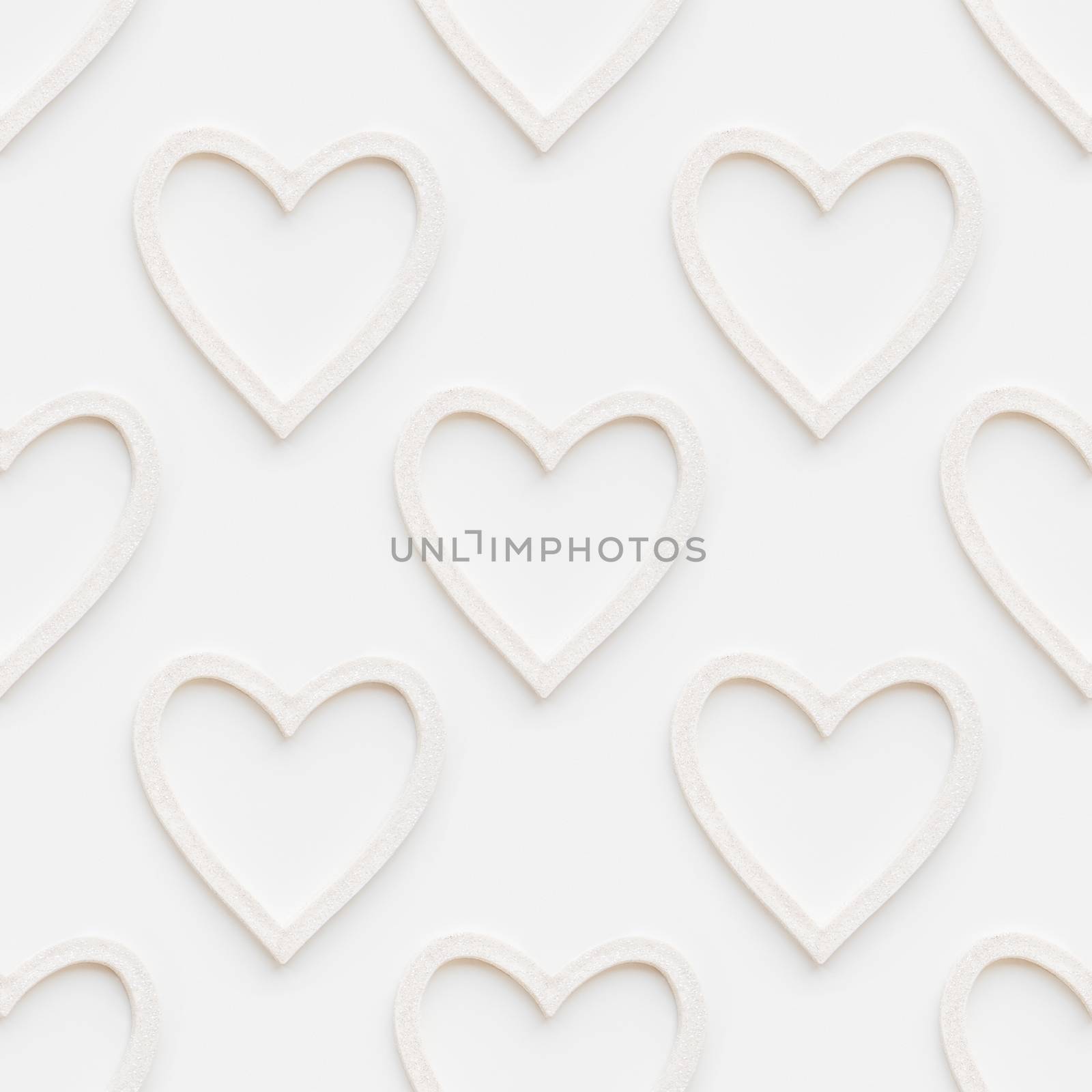 Seamless pattern with decorative hearts. Christmas or Valentine's Day decorations on white background. Symbol of love, photo pattern.