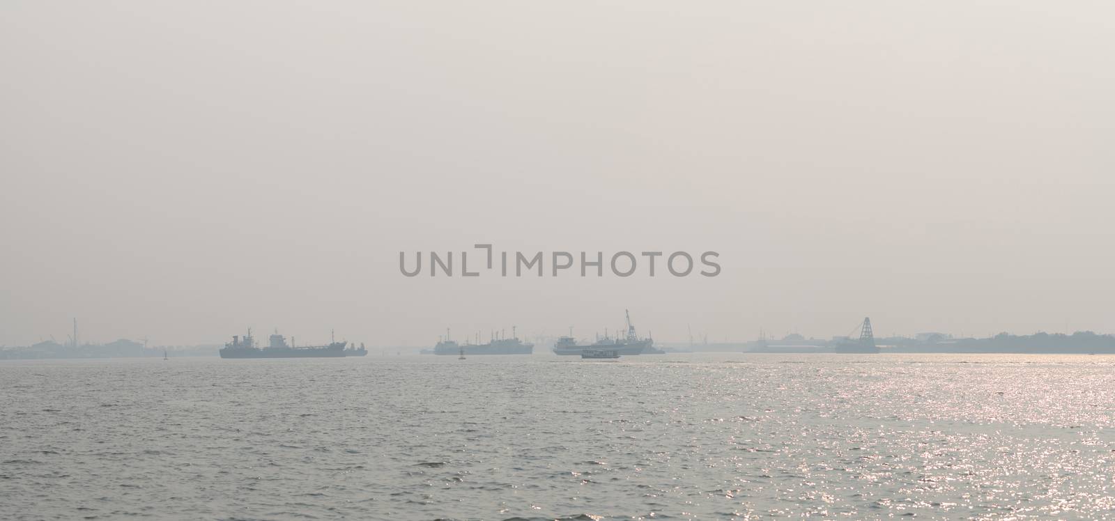 Air pollution at the pier. Bad air quality filled with dust caus by Fahroni