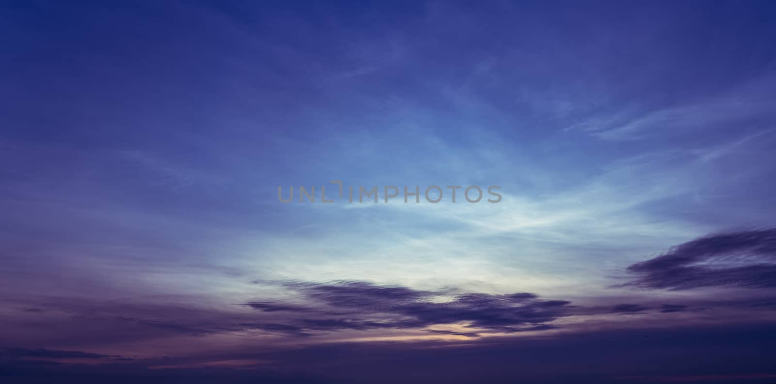 Beautiful cloudscape sunrise sky. Blue and purple sky at sunrise by Fahroni