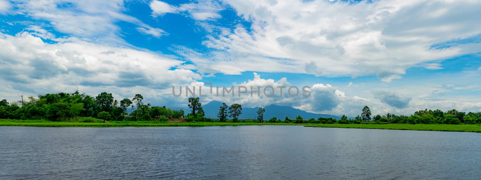 Beautiful landscape view of lake in front of the mountain with b by Fahroni