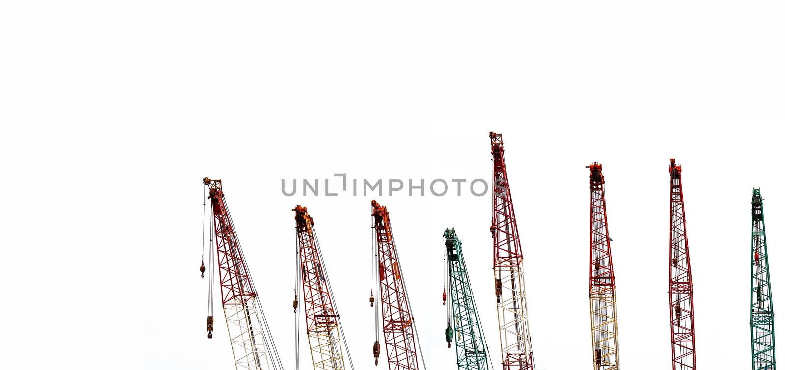 Set of big construction crane for heavy lifting isolated on white background. Construction industry. crane for container lift or at construction site. Crane rental business concept. Crane dealership.