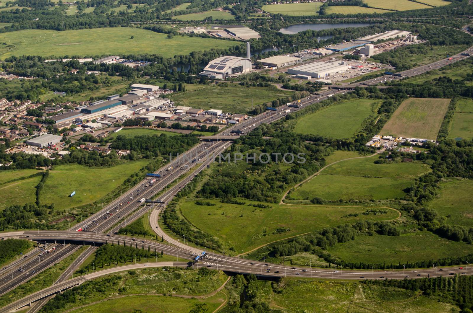 View from a low flying plane of the M25 motorway near Poyle, Berkshire. The Colnbrook incinerator is towards the top of the picture.  