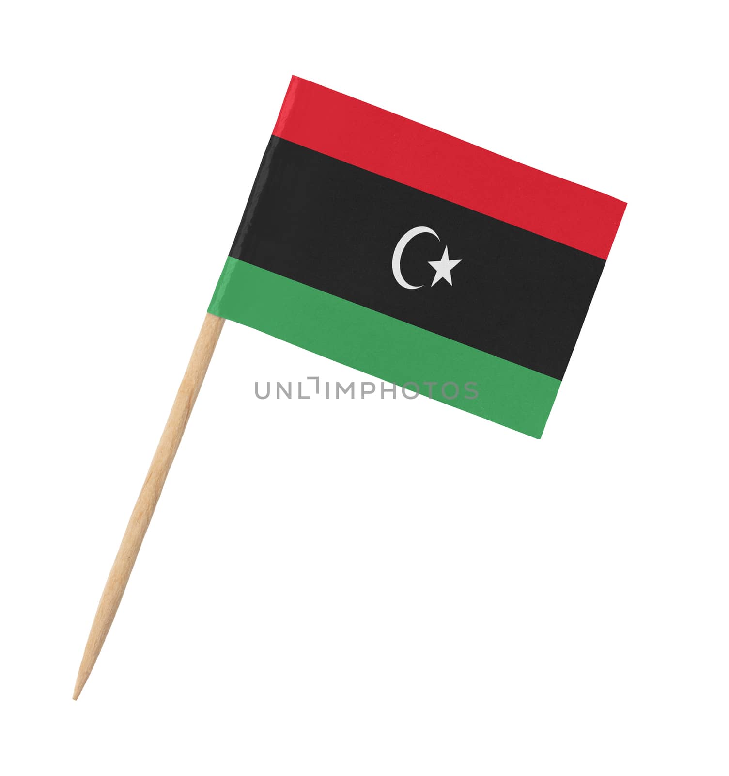 Small paper flag of Libya on wooden stick, isolated on white