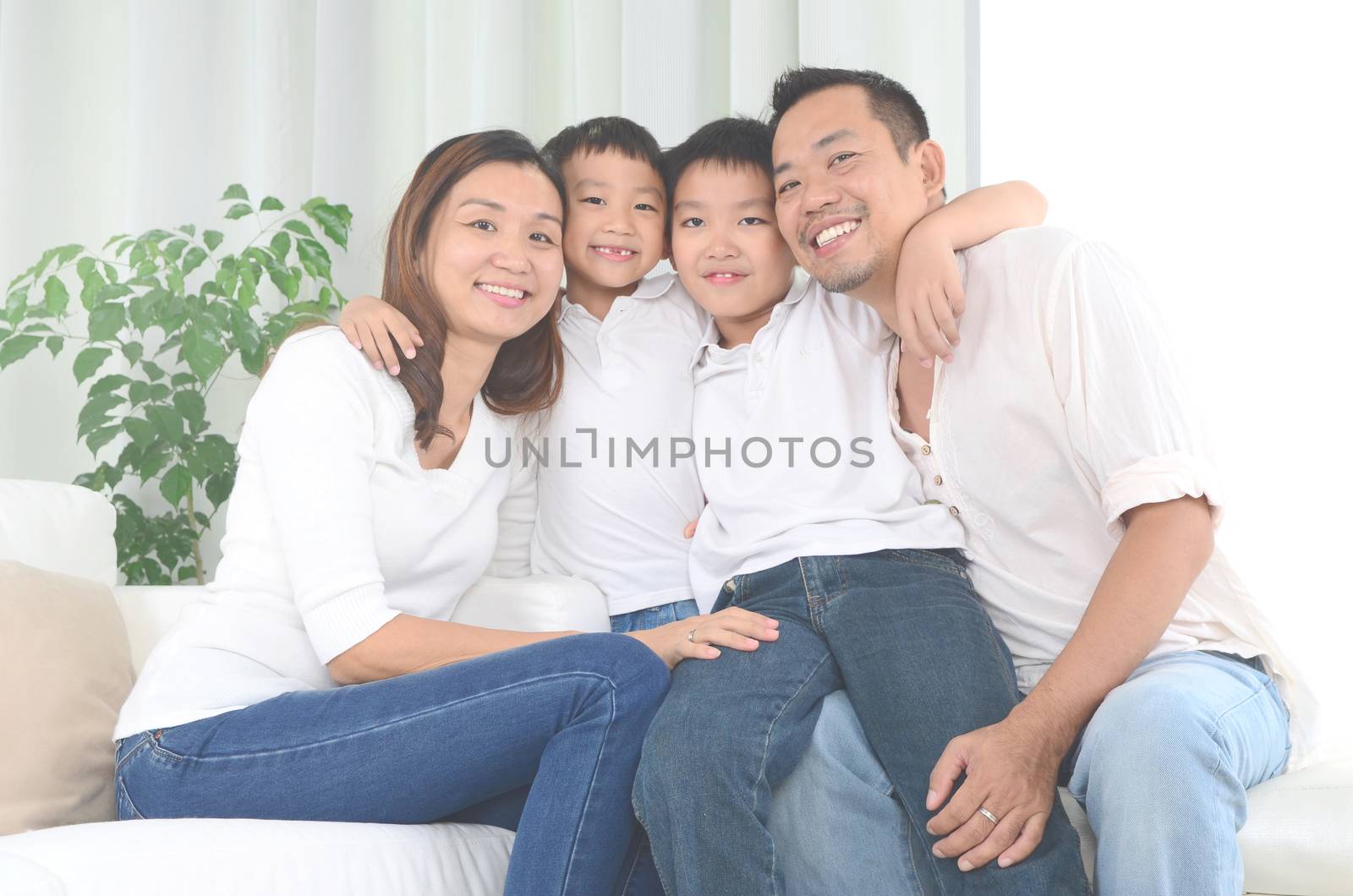 happy asian family parent spending time with their smiling children.