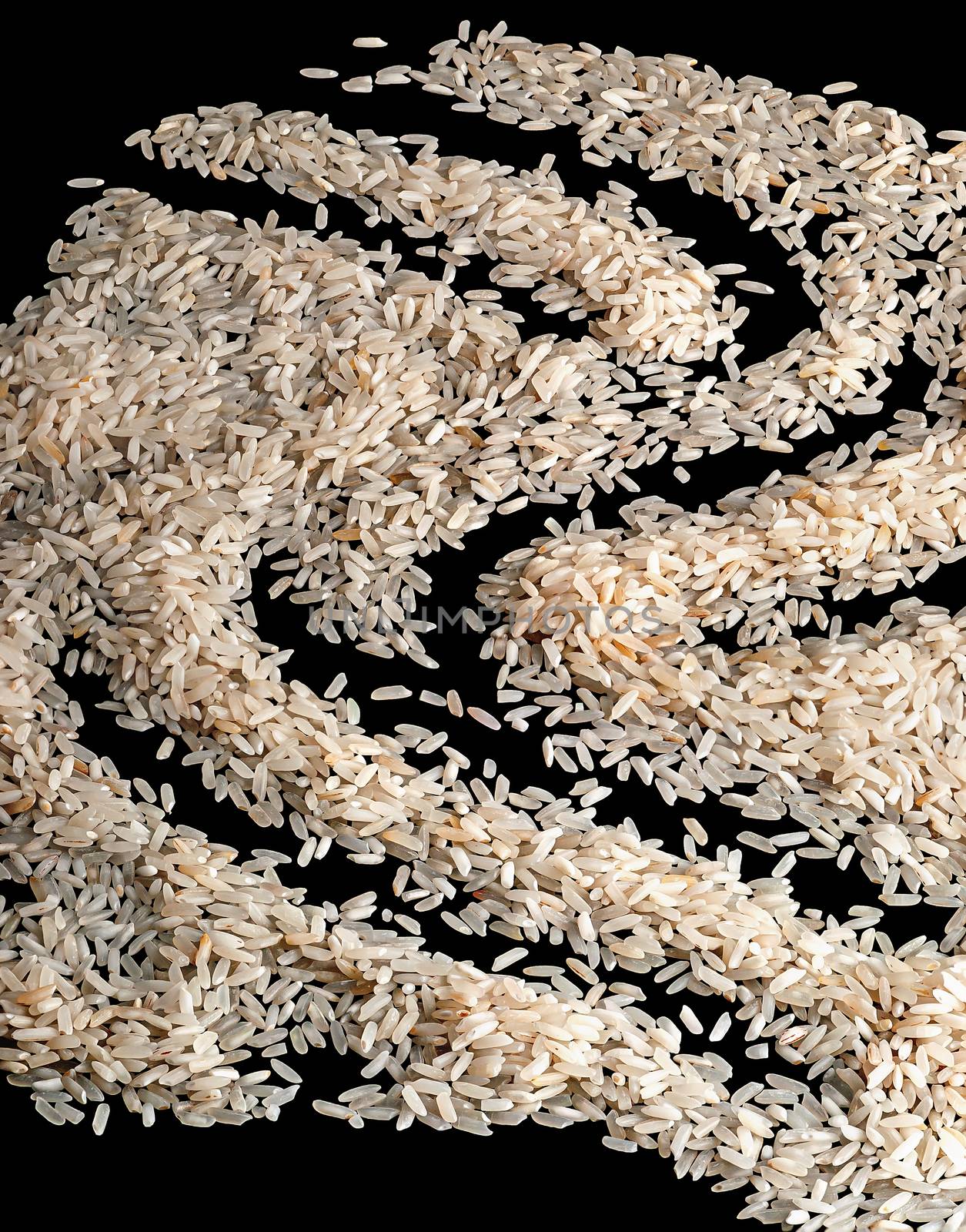 Abstrack background scattered dry rice on black