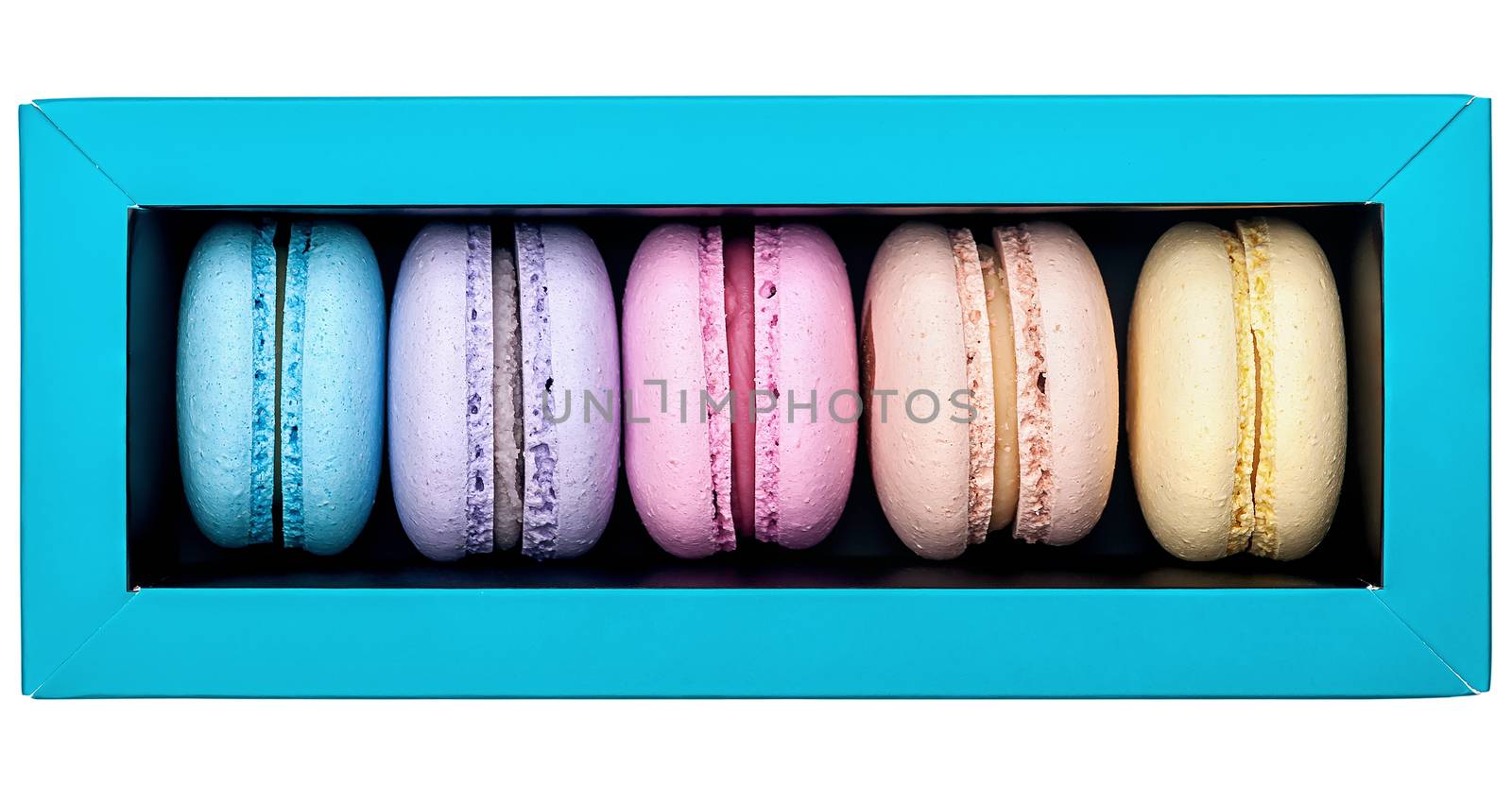 Multicolored macaroon in box top view by Cipariss