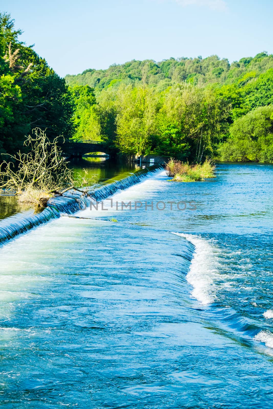 The River Leven weir on a sunny day in Sept by paddythegolfer