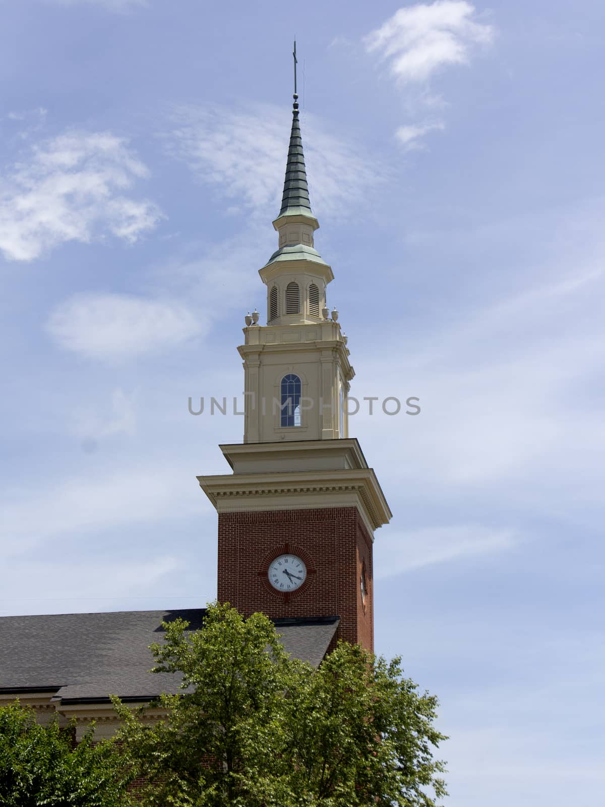 Church steeple with clock by CharlieFloyd