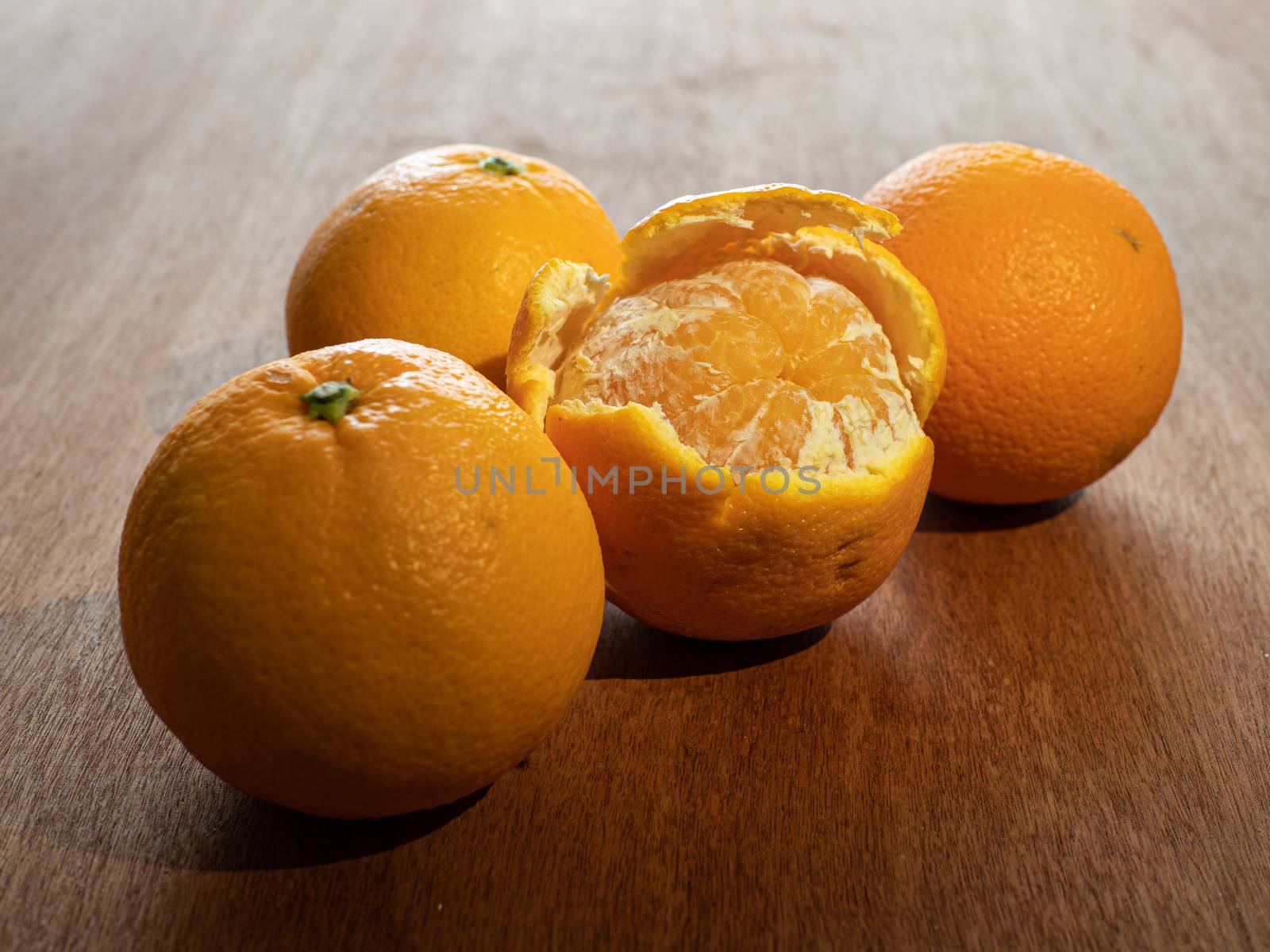 tangerines on a wooden table