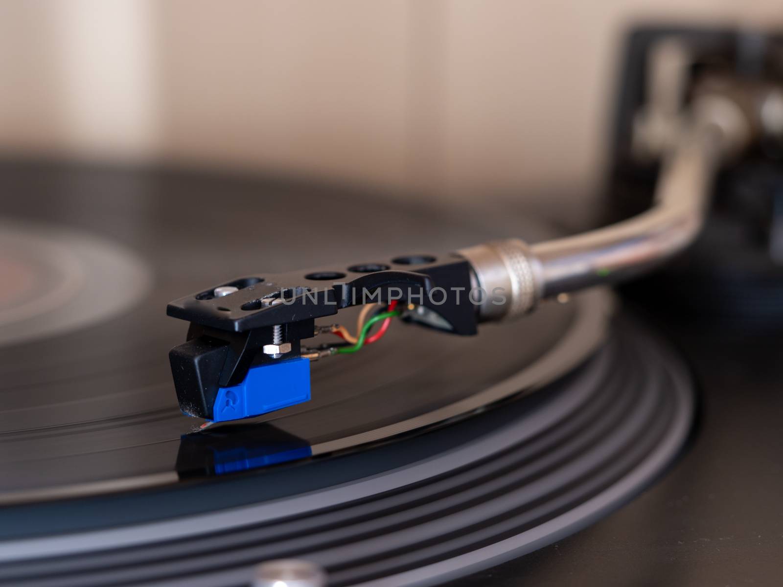 record player arm in close view by jmagfoto