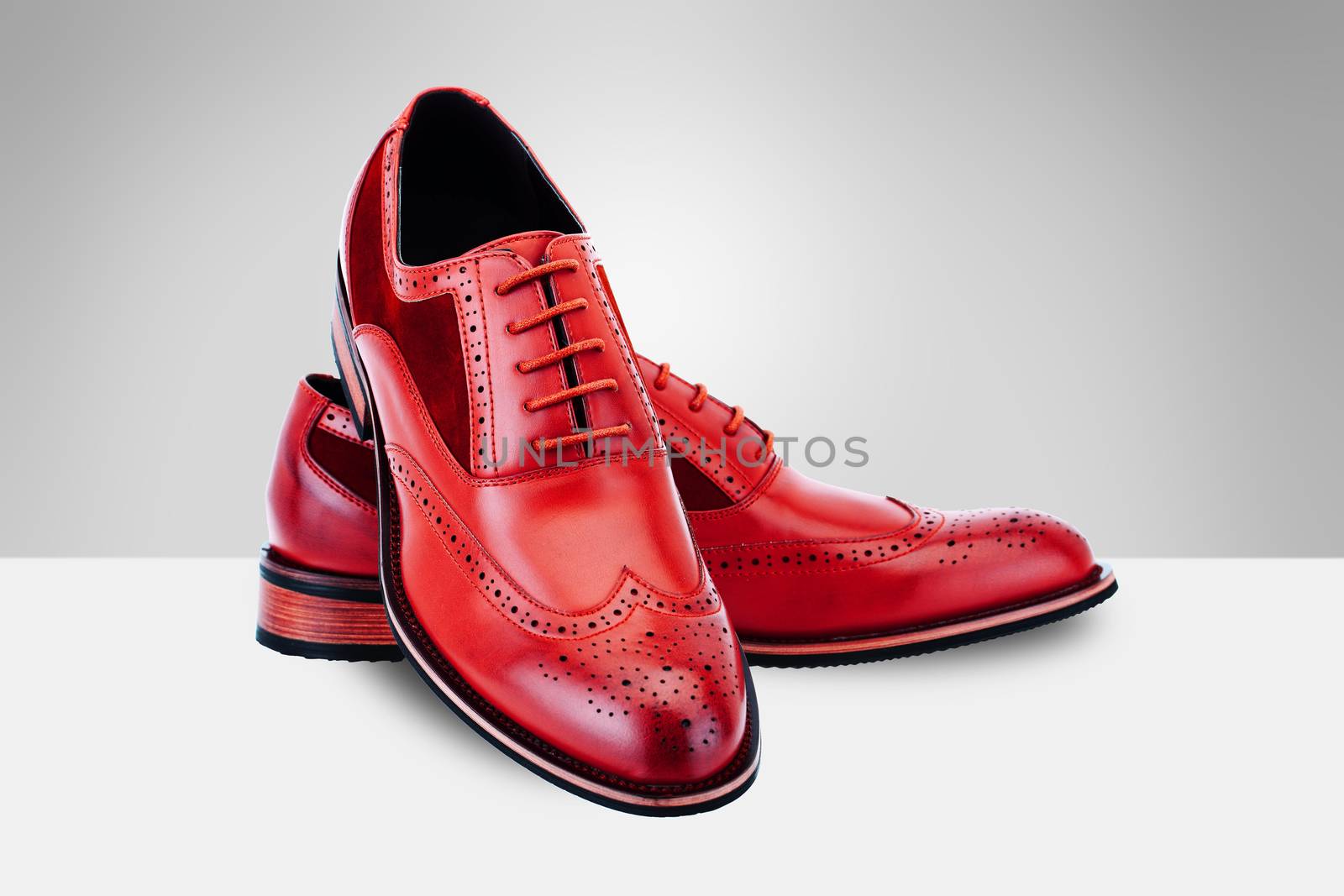 Red Men`s Shoes on split background