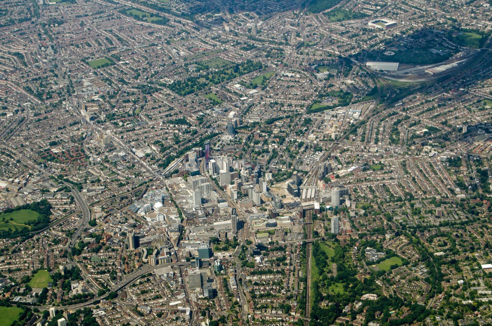 View from the air looking North across Croydon in south London.  The Crystal Palace football team's home ground Selhurst Park is towards the top right and in the centre is East Croydon railway station. Sunny, summer day.