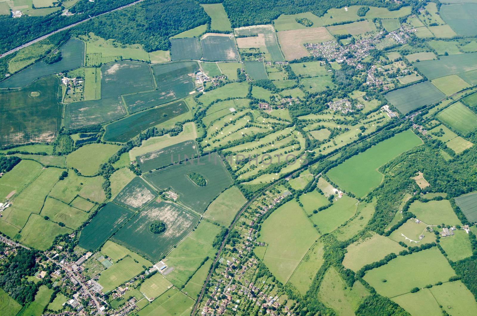 Aerial view of the Kent villages of Otford and Shoreham with the Darenth Valley Country Club and golf course in between.  Viewed on a sunny summer day.  