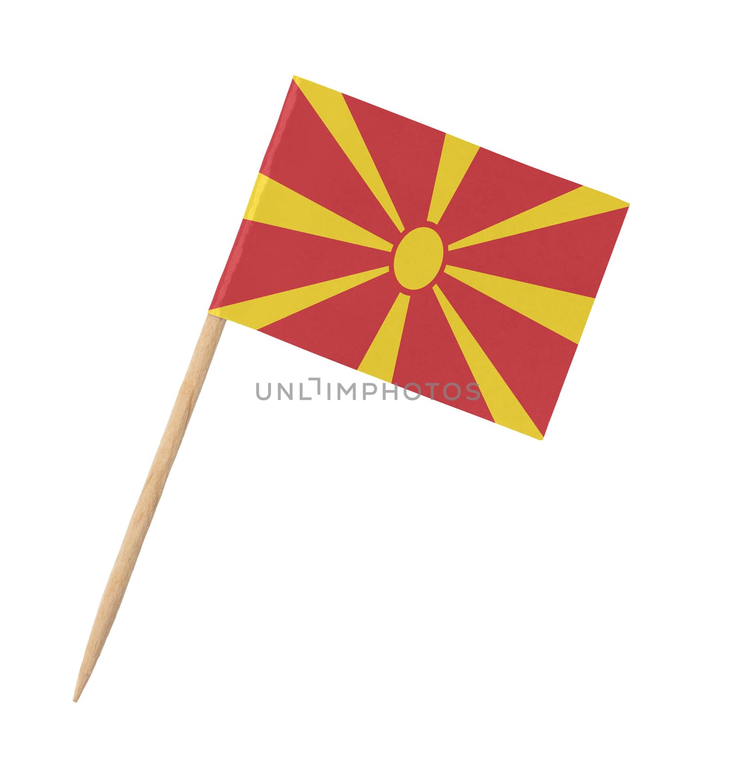 Small paper flag of Macedonia on wooden stick, isolated on white