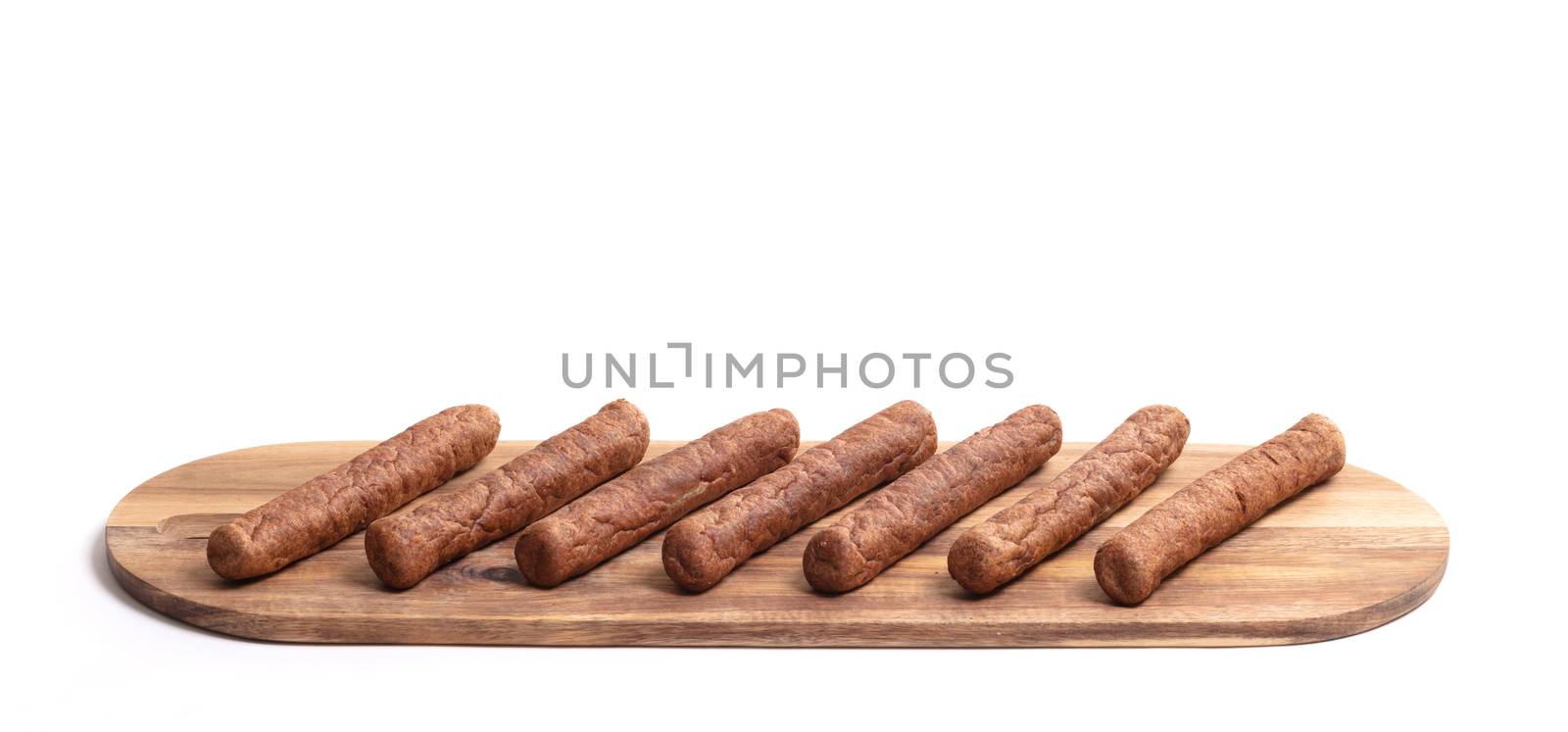 Wooden tray with frikadellen, a Dutch fast food snack by michaklootwijk