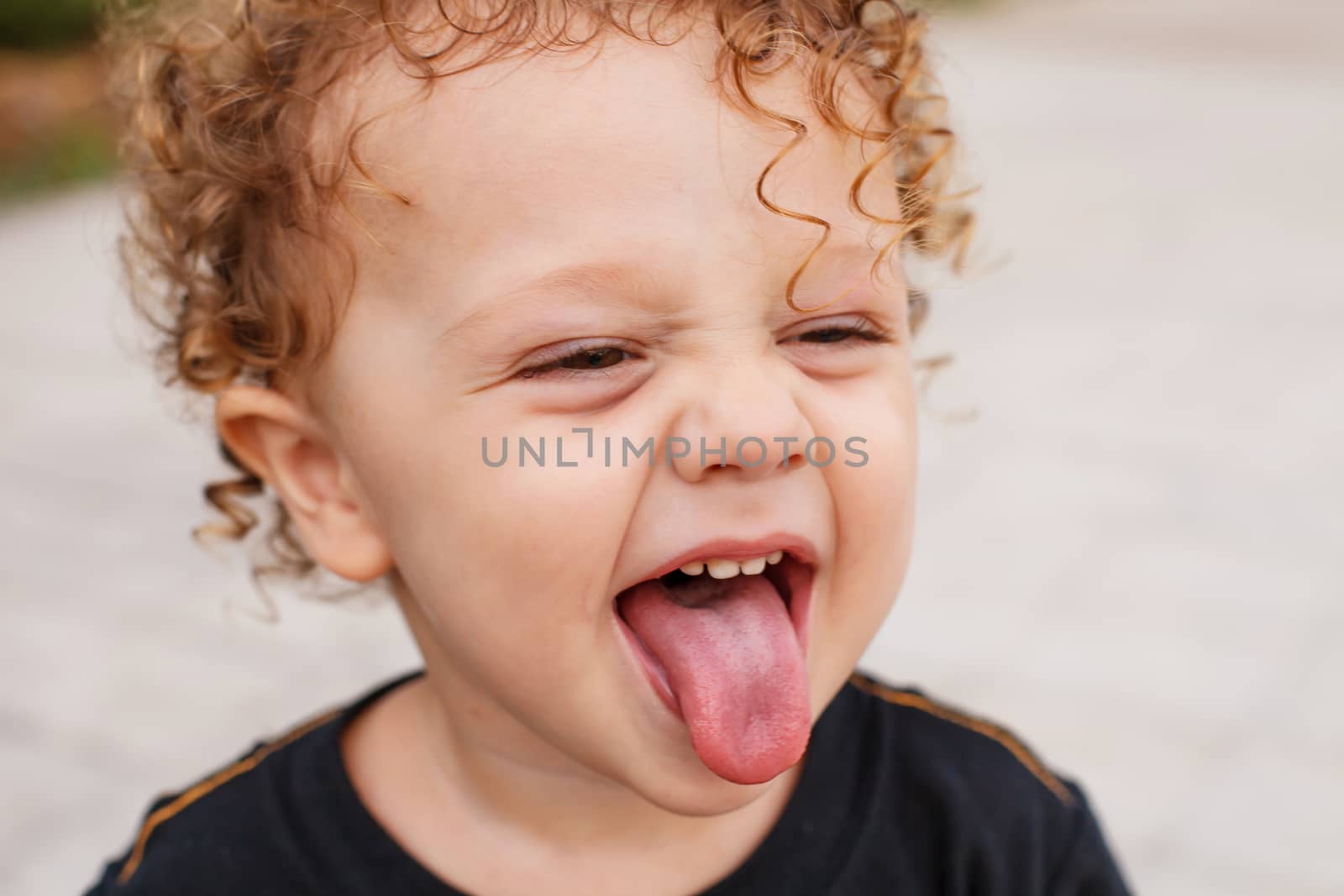 Portrait of happy child by altanaka