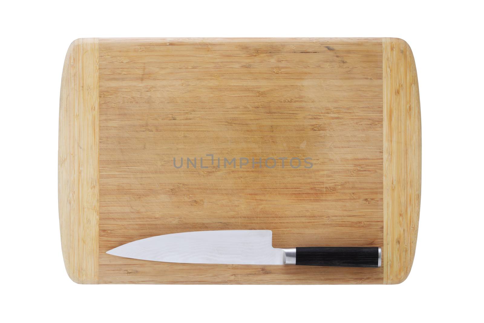 A wood chopping board and Japanese chefs knife isolated on white with clipping path