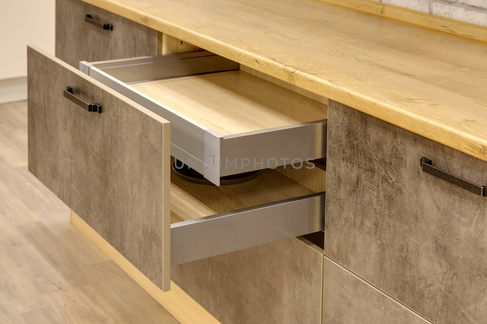 a kitchen interior with drawers by sveter