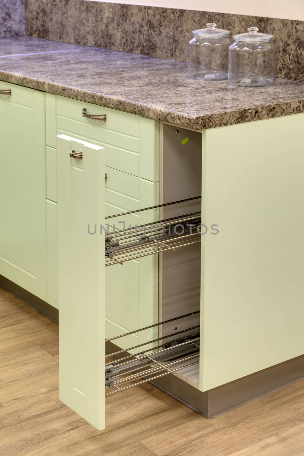 a kitchen interior with drawers by sveter