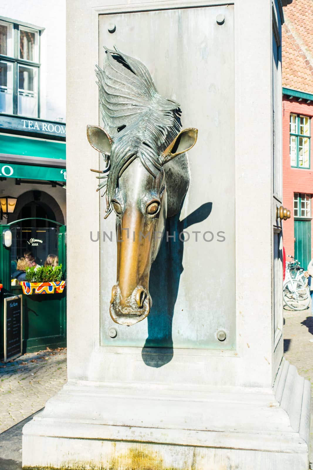 Drinking fountain for horses in historic center of Bruges, by paddythegolfer