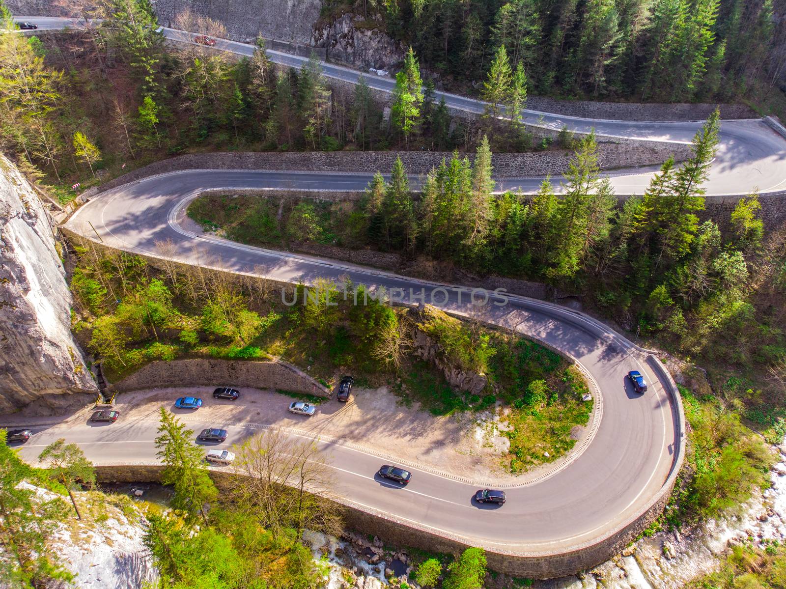 Aerial view of curvy forest road by savcoco