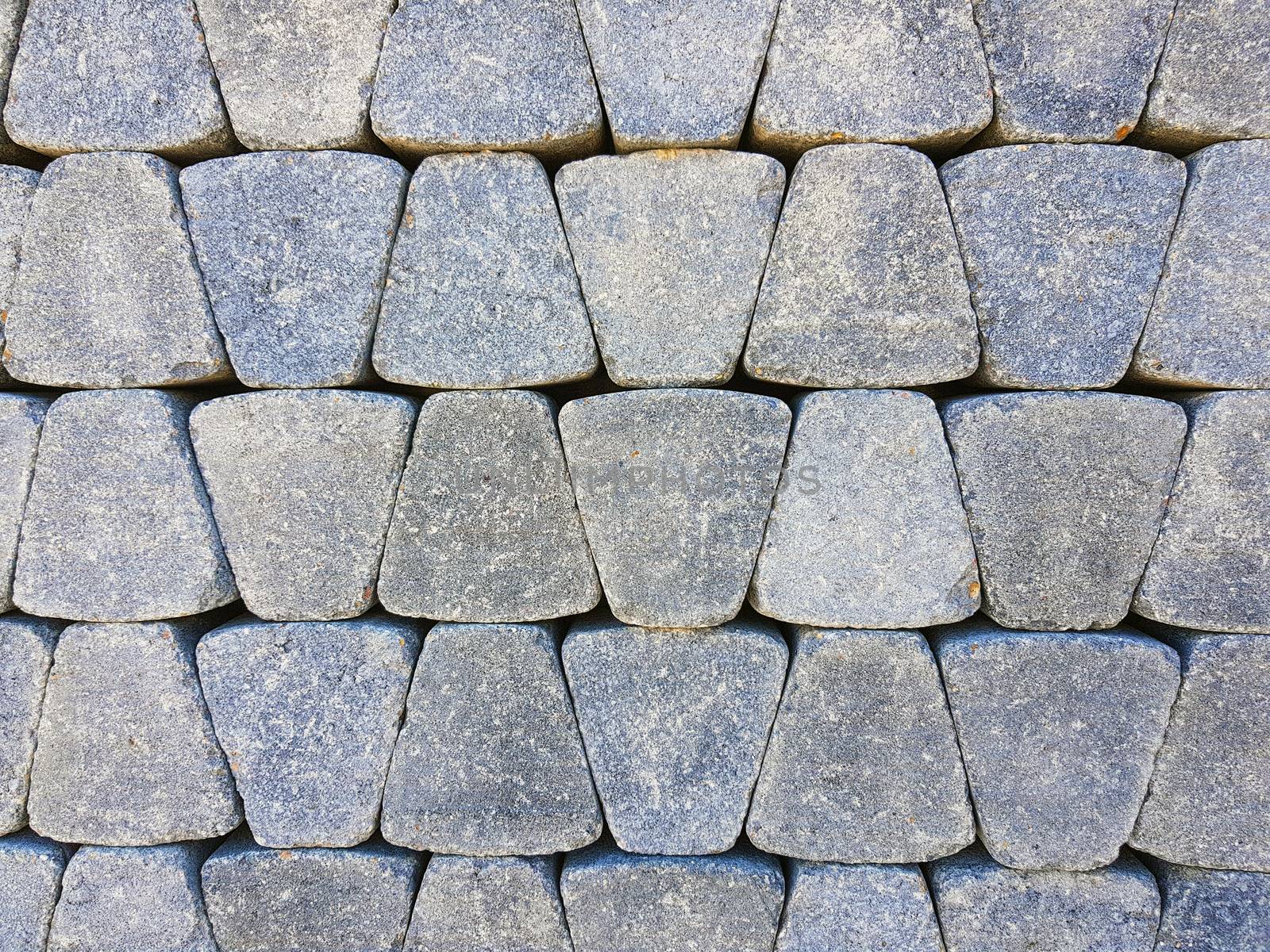 Tiles of pavement pile as background