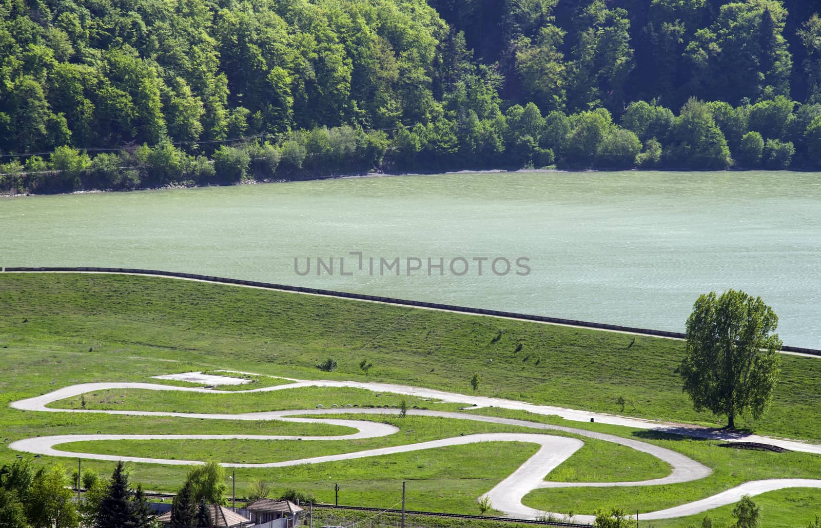 Karting race circuit near lake, aerial view
