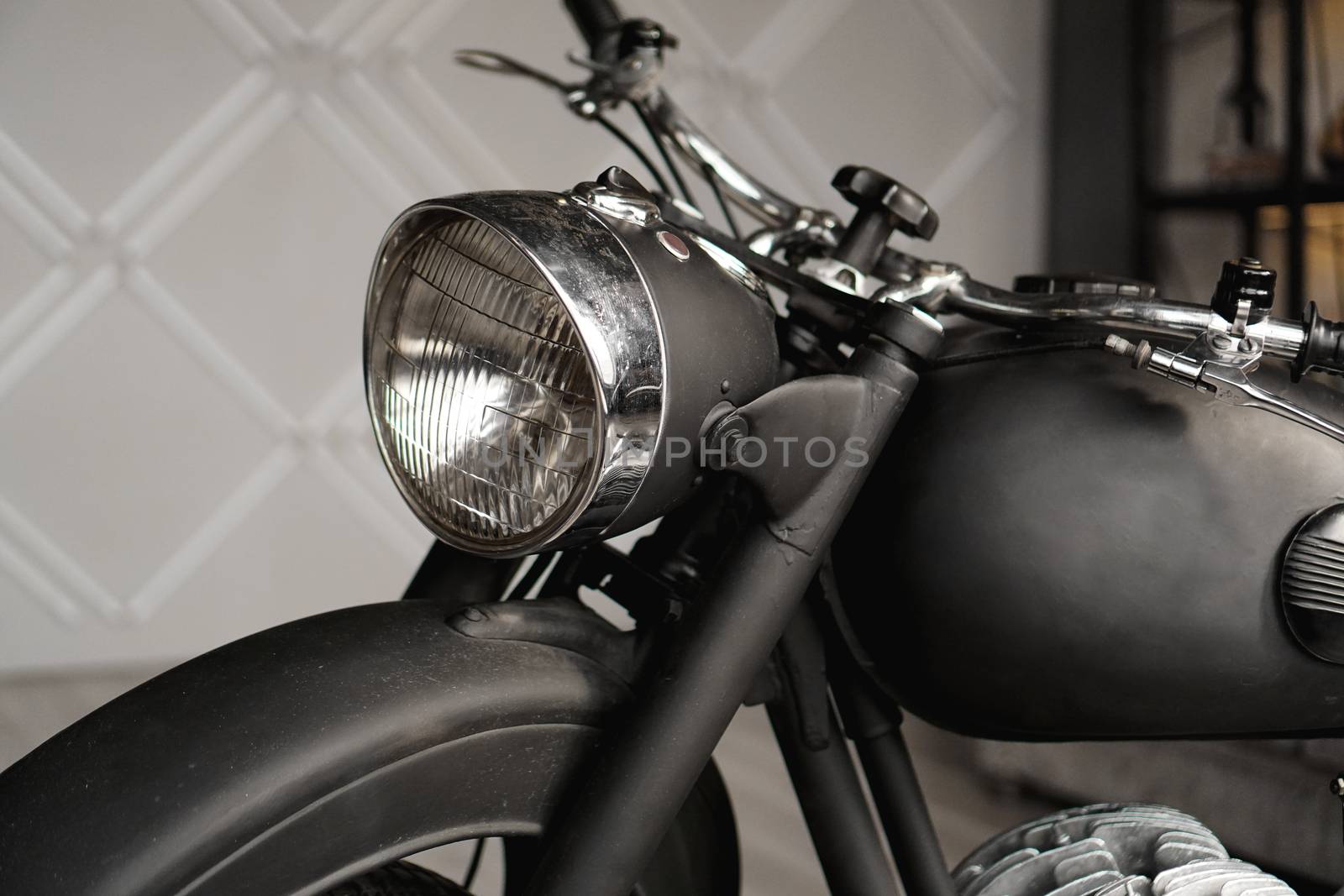Motorcycle close-up in the room. Photo from the studio