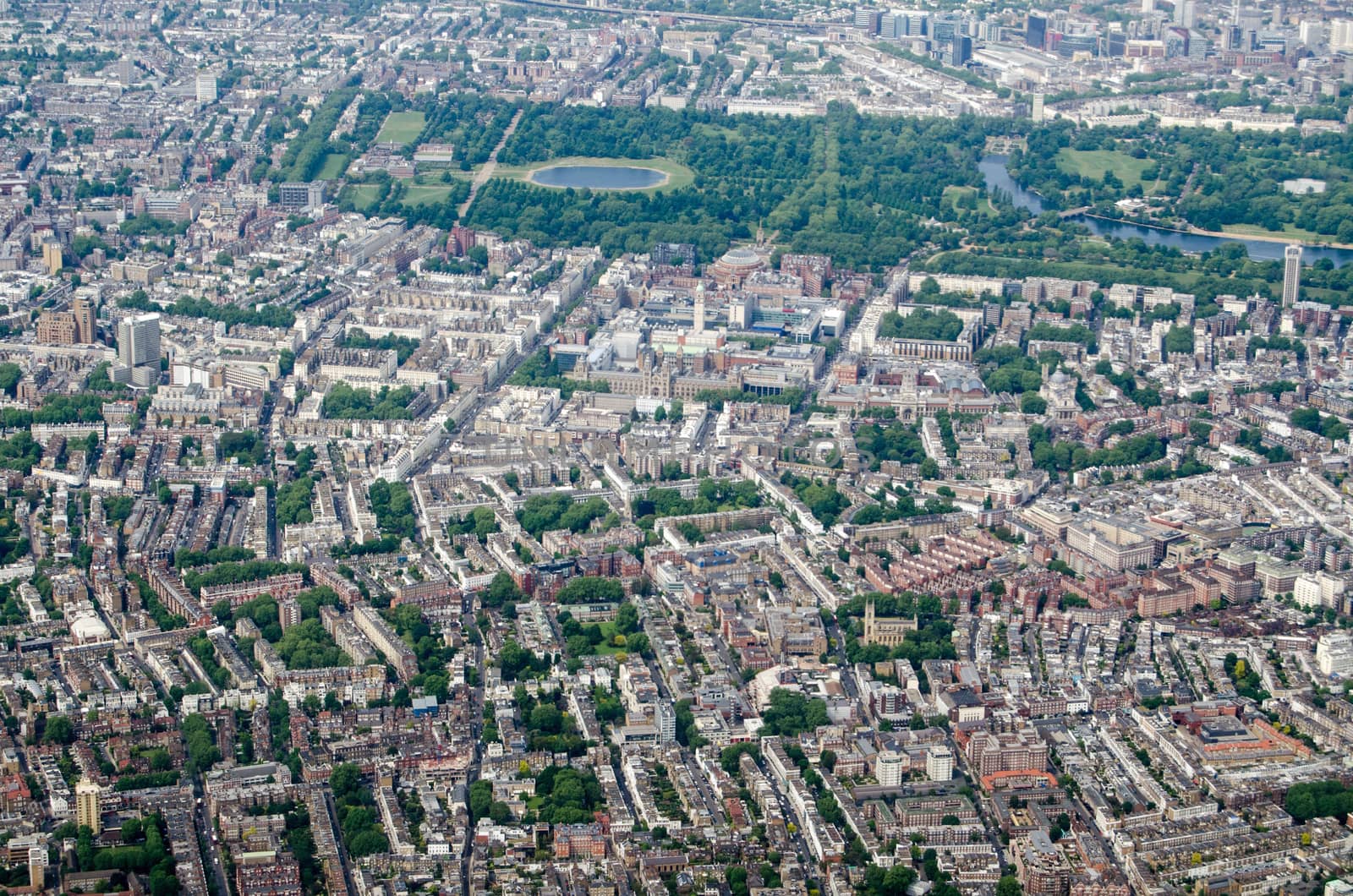 Aerial view looking north across South Kensington, Albertopolis and Hyde Park in central London on a sunny morning.  