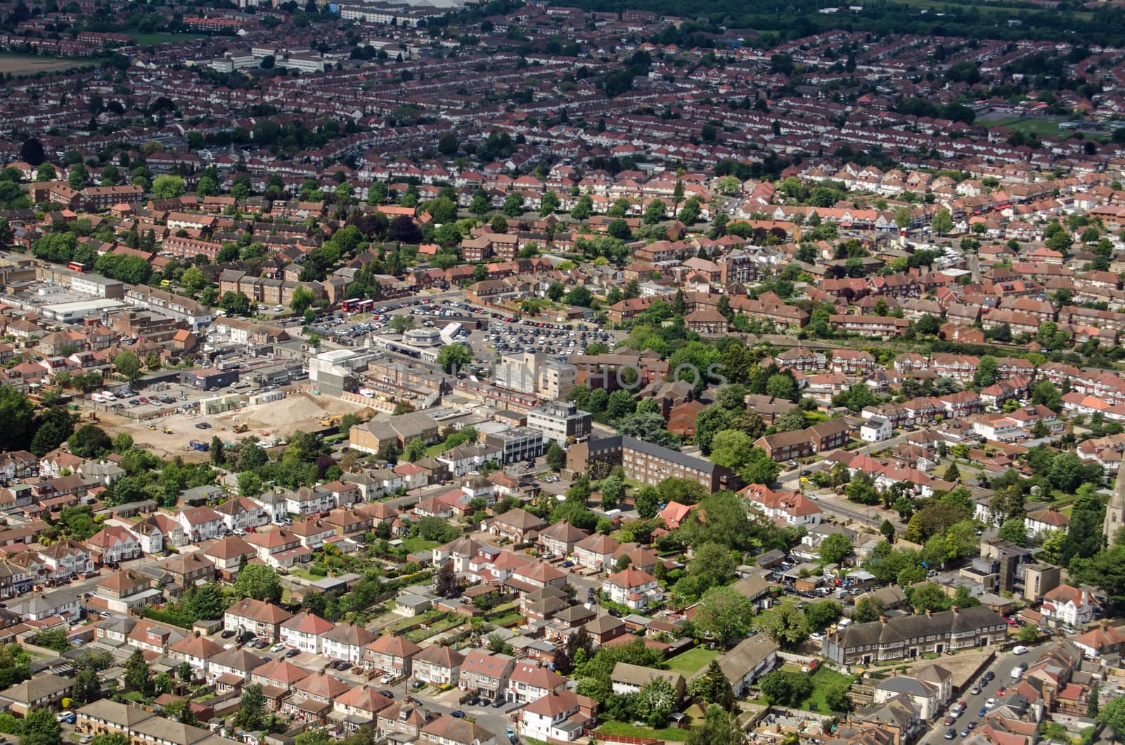 Aerial view of Hounslow West in London on a sunny summer view.  The Piccadilly Line station of Hounslow West is in the middle of the image. 