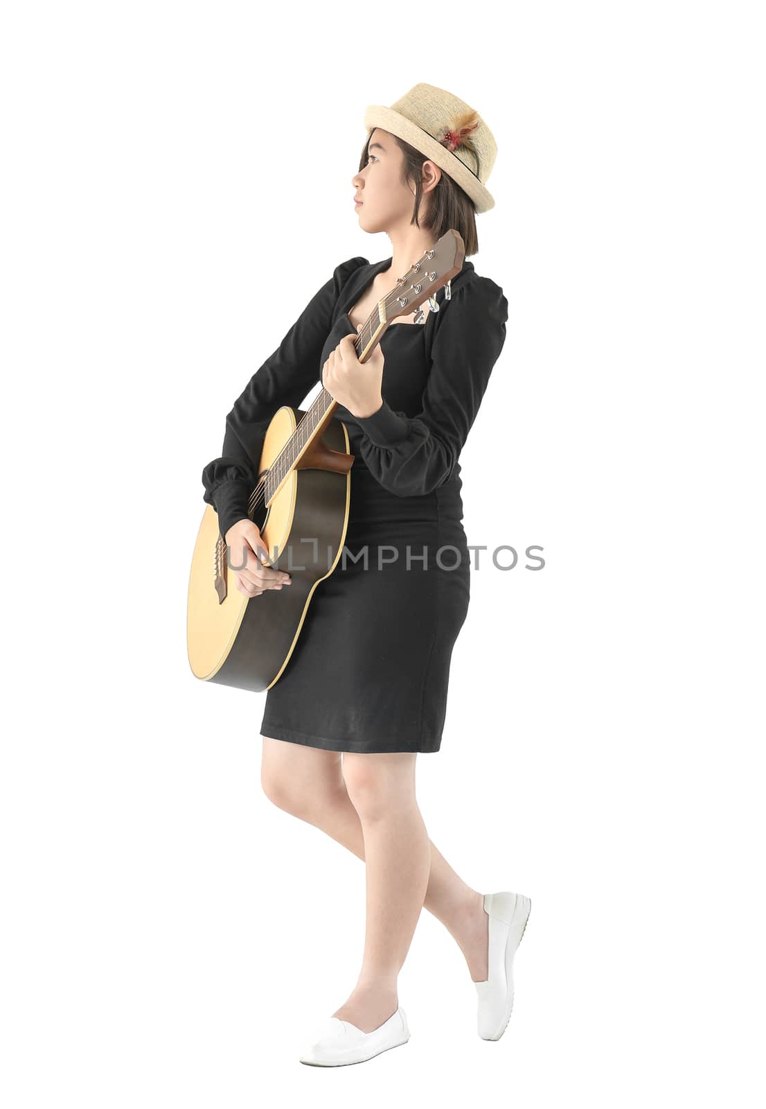 Woman hold guitar guitar folk song in her hand by stoonn