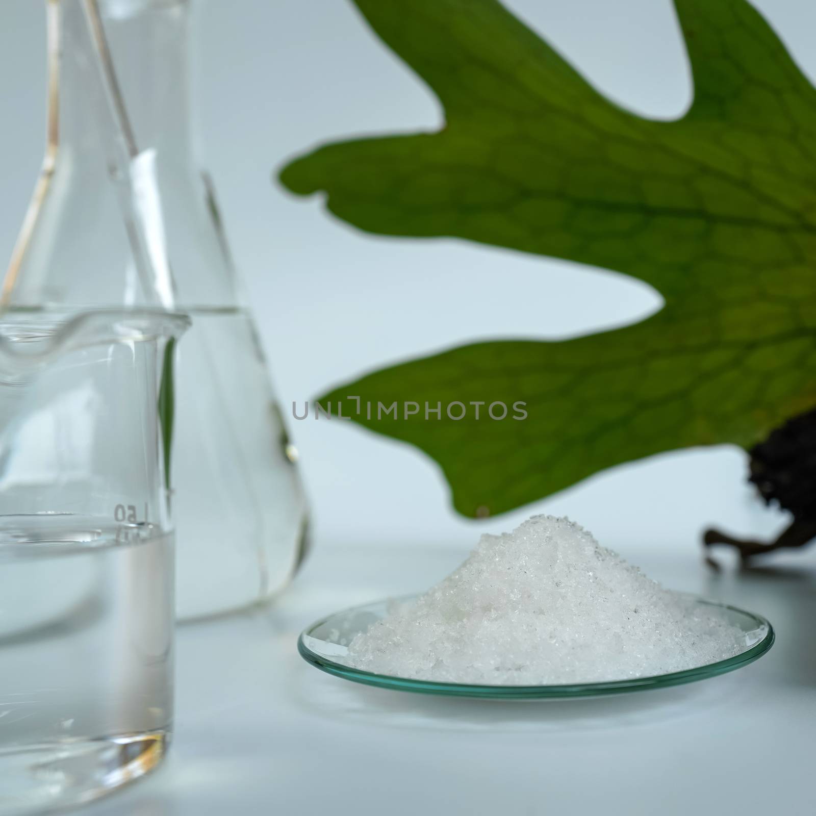 Closeup Potassium chloride on white laboratory table. Chemical used in OTC products and topical pharmaceuticals.