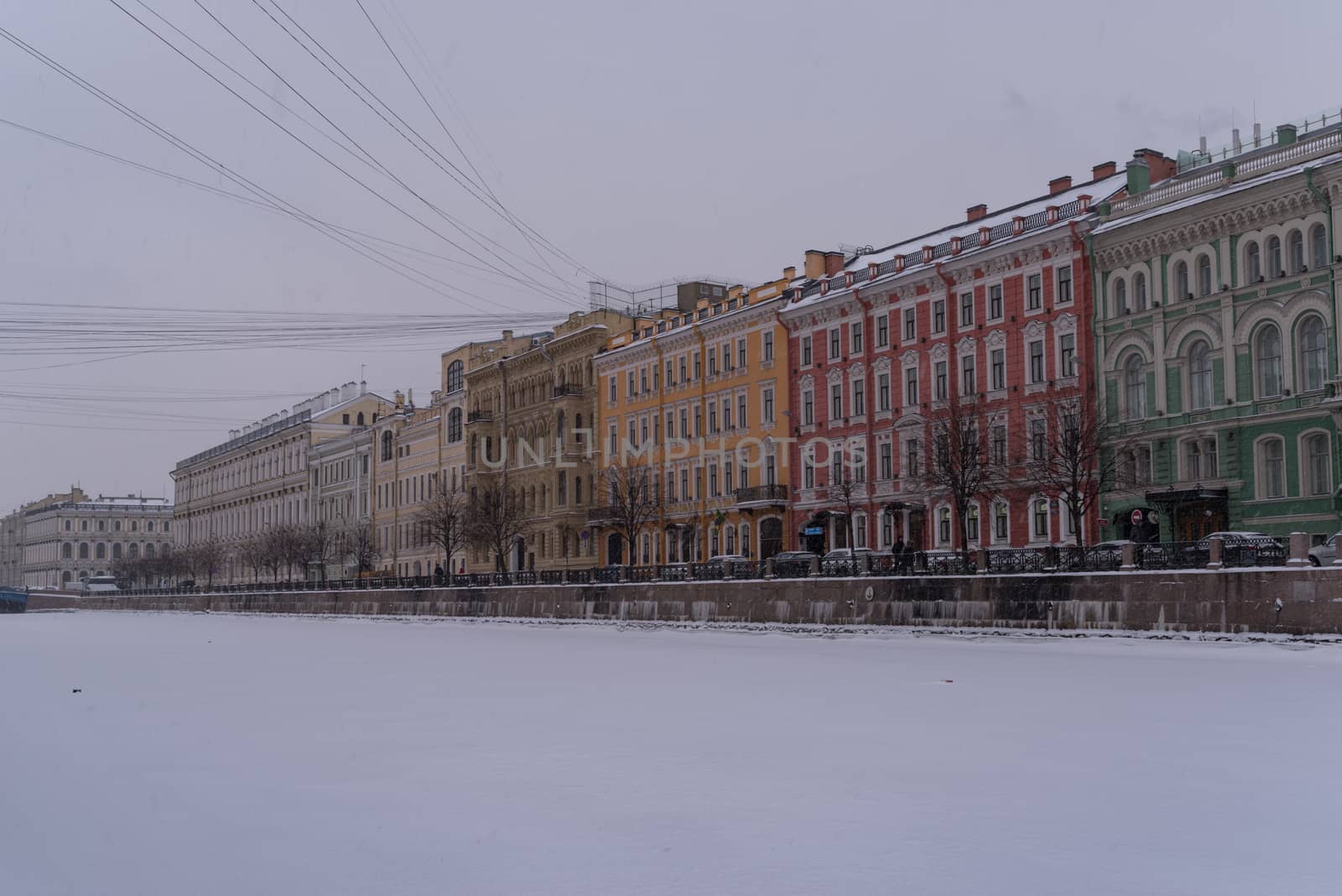Embankment of ice covered Moyka river in snow weather. Saint Pet by Smoke666