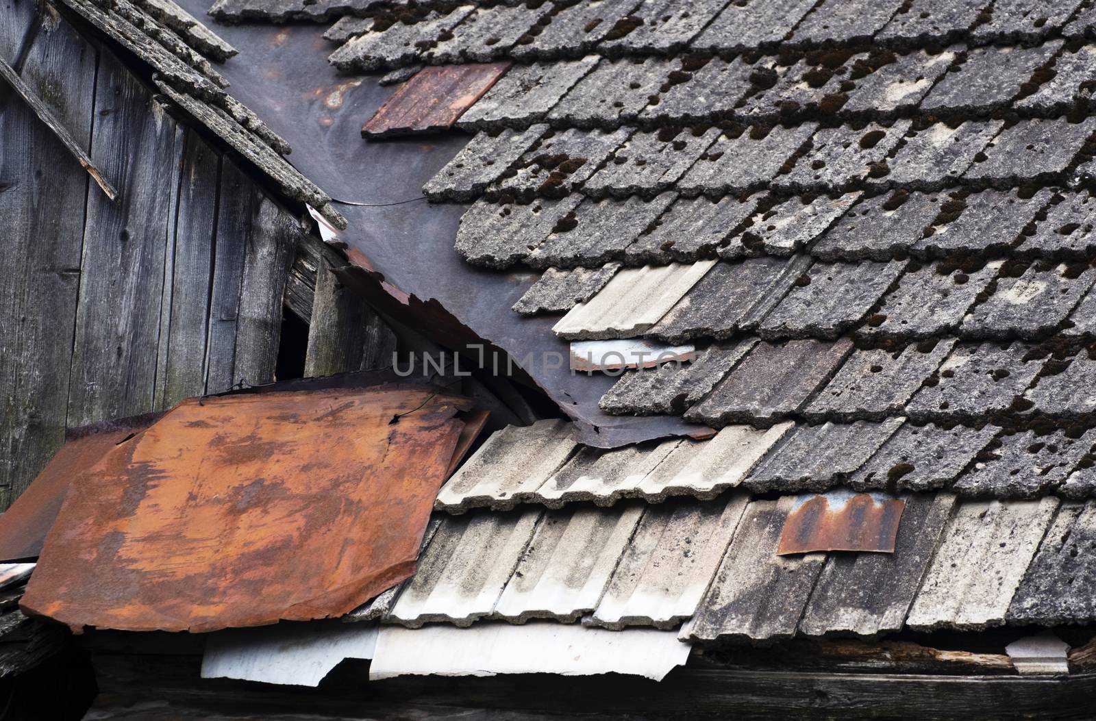 detail of an old roof made of concrete tiles by Ahojdoma