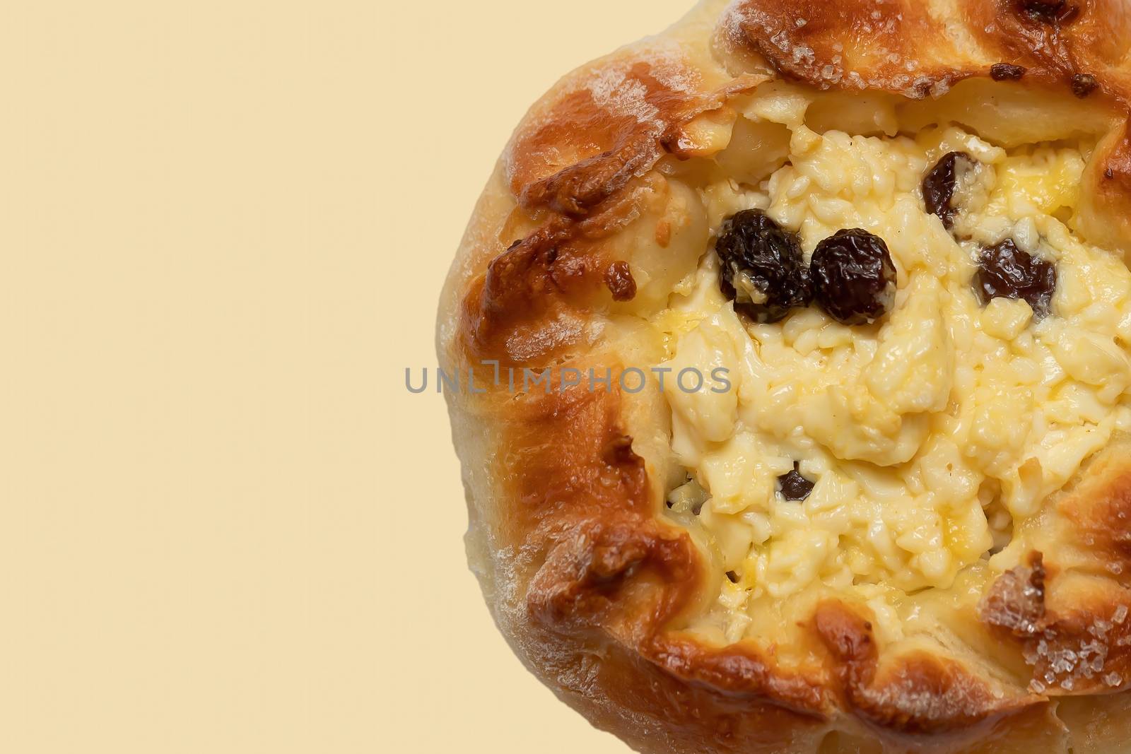 Fresh homemade open patties with cottage cheese (traditional Russian pastry vatrushka, round buns, curd tart) on linen napkin, white background, selective focus, closeup