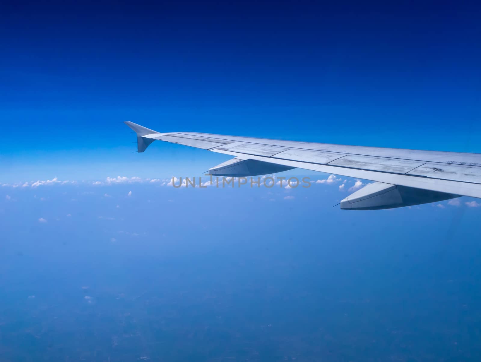 The looking at aircraft wing view from windows