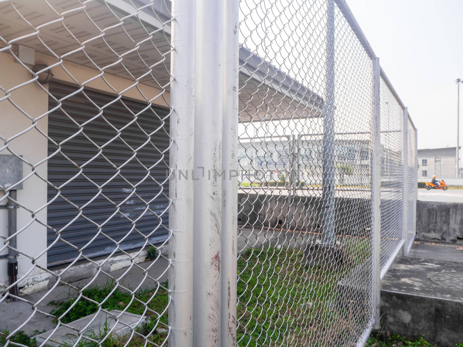 The Transformer station closed fence with barbed wire