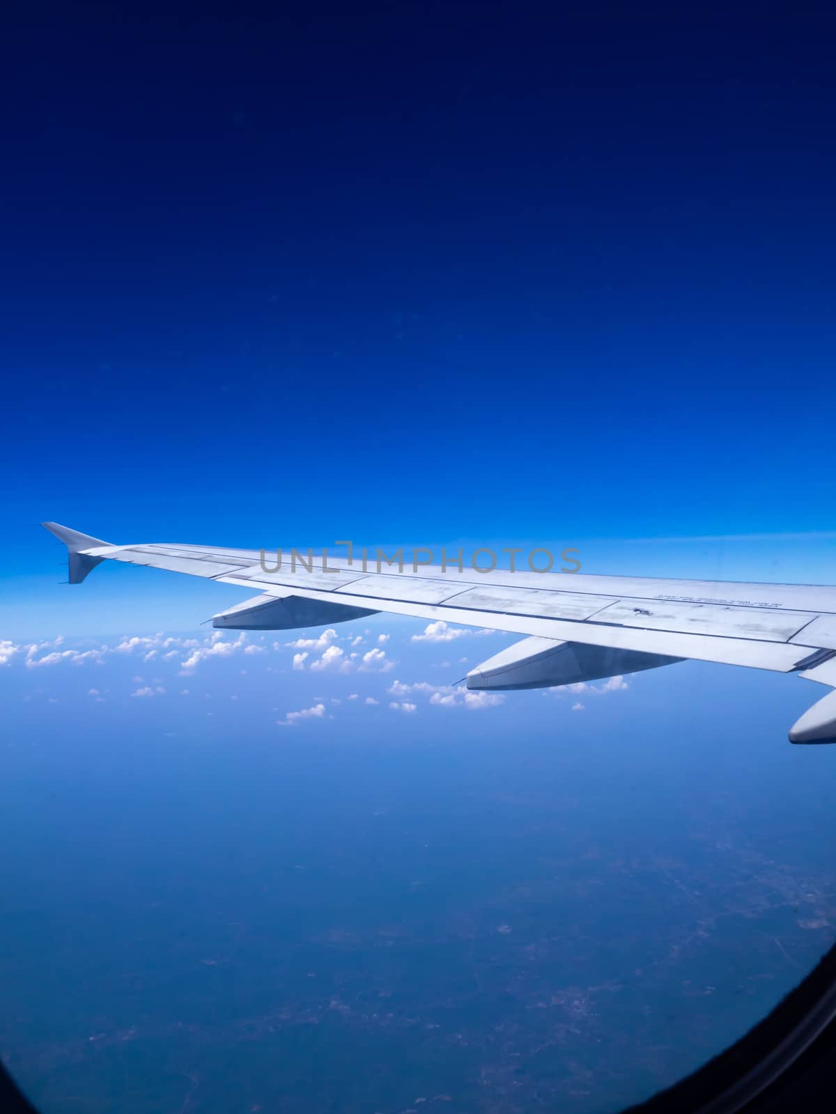 The looking at aircraft wing view from windows
