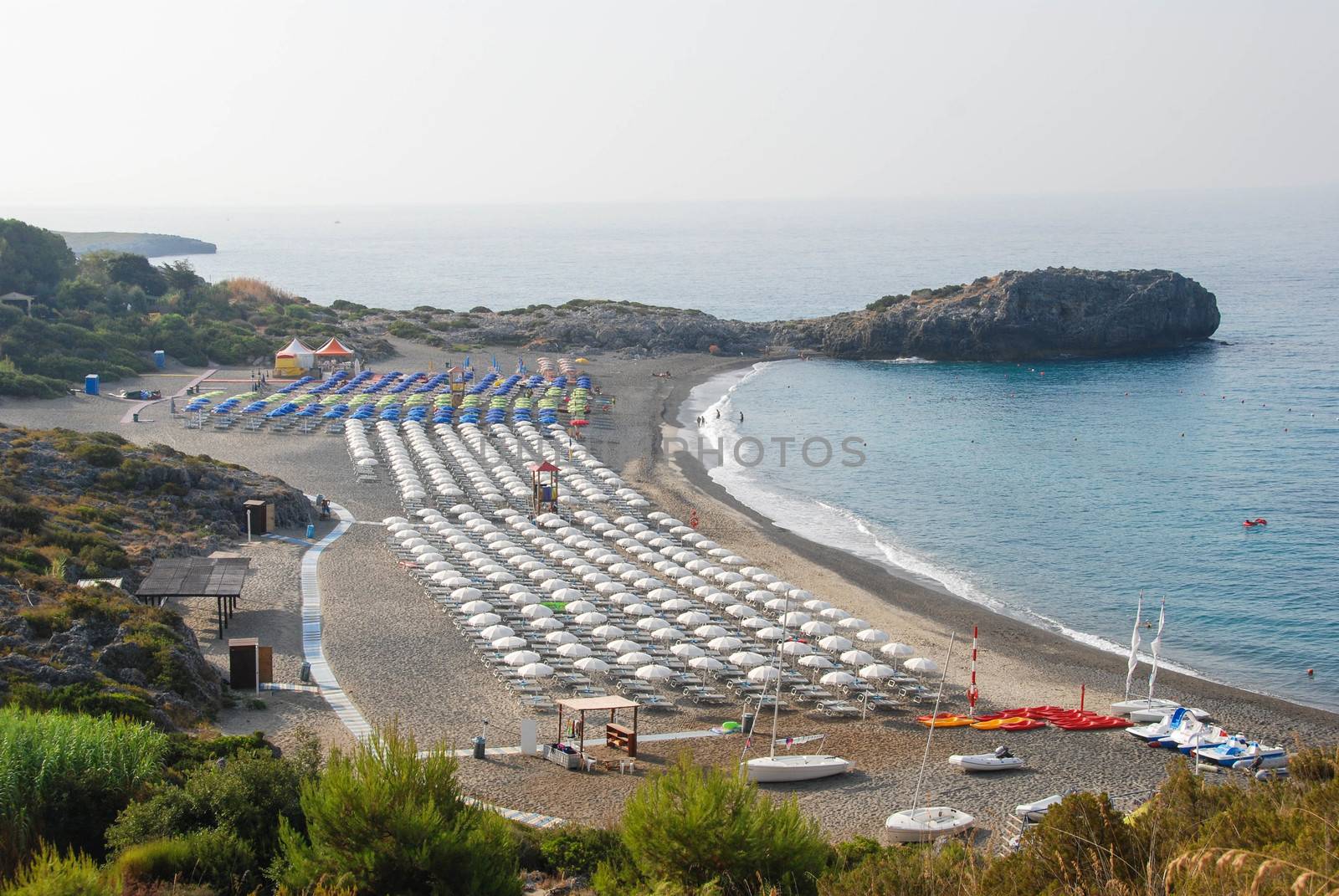 Parasol on the beach by cosca