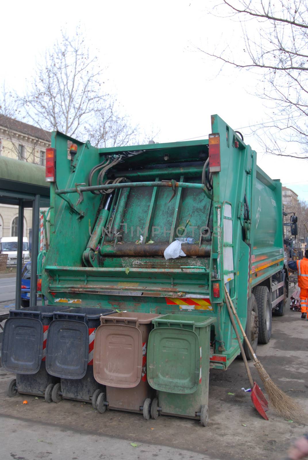 Bins with waste with food waste at the market