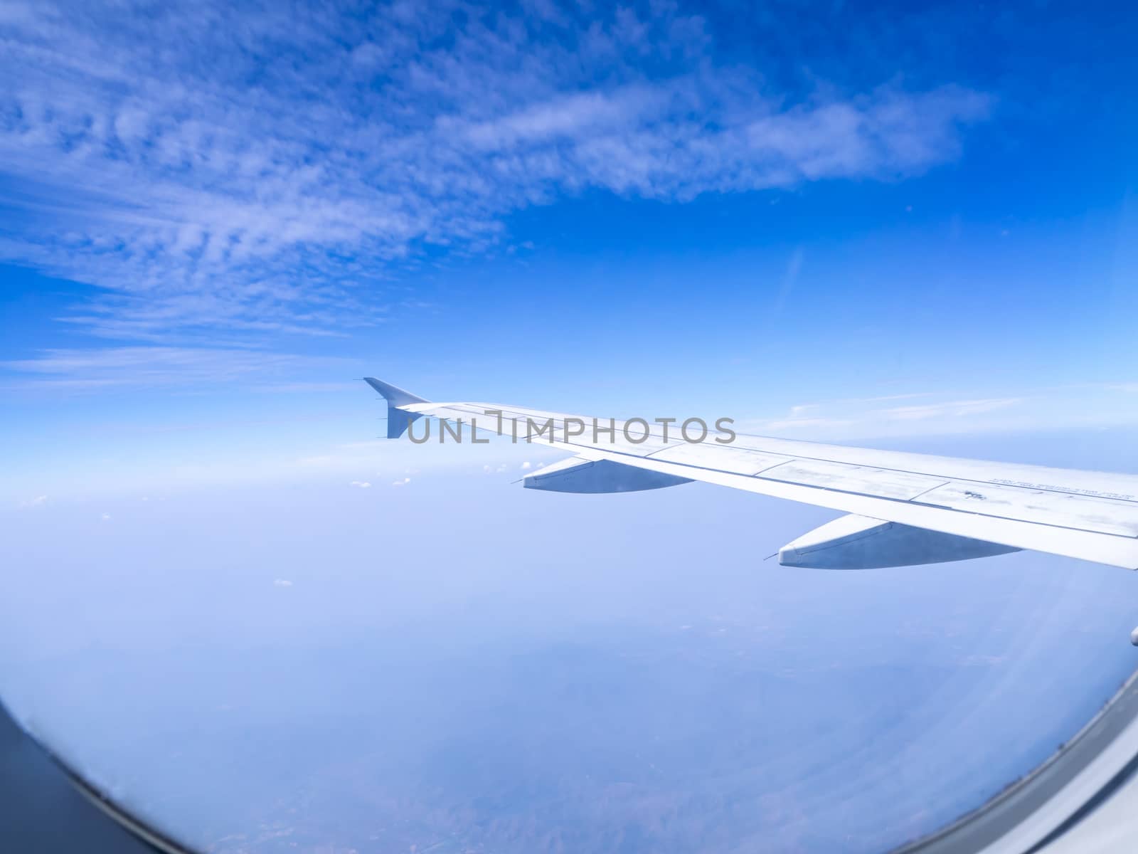 The looking at aircraft wing view from windows