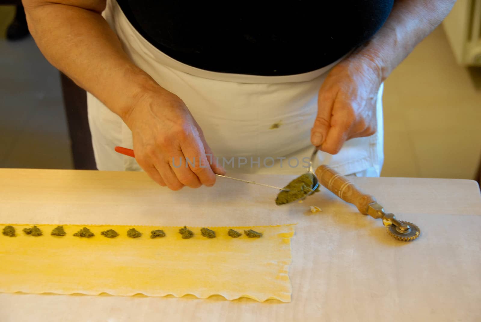 Preparation of agnolotti. Typical pasta of the Langhe, Piedmont - Italy