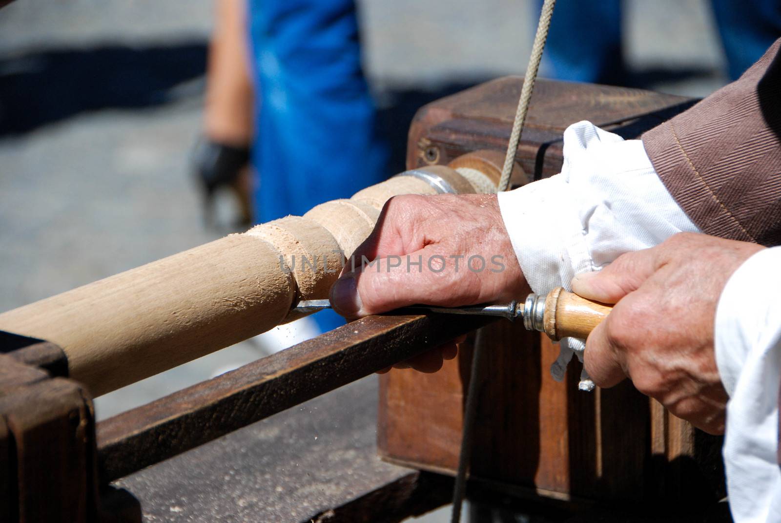 Turner works at one leg of a table