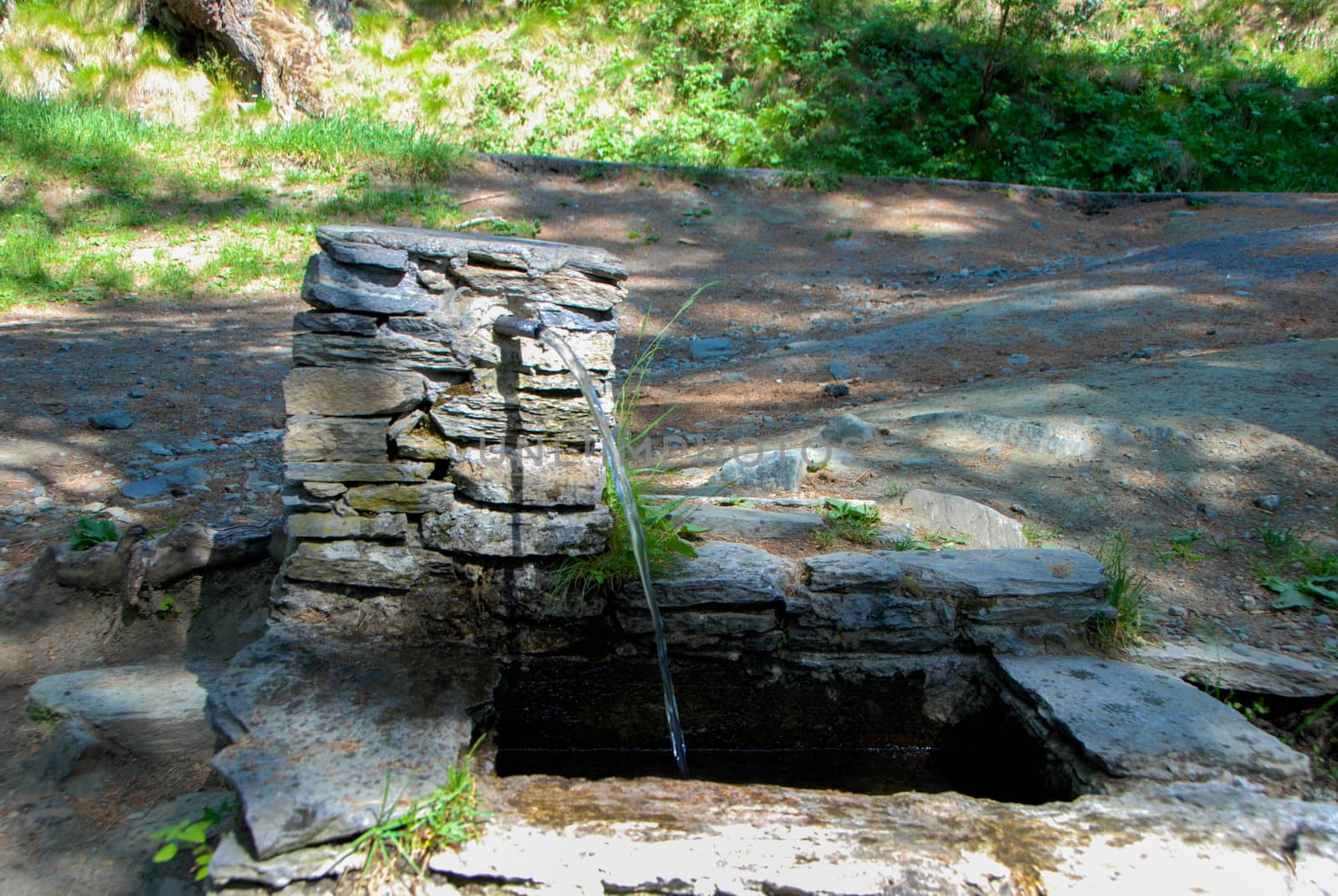 A stone fountain near Pracatinat, Piedmont - Italy