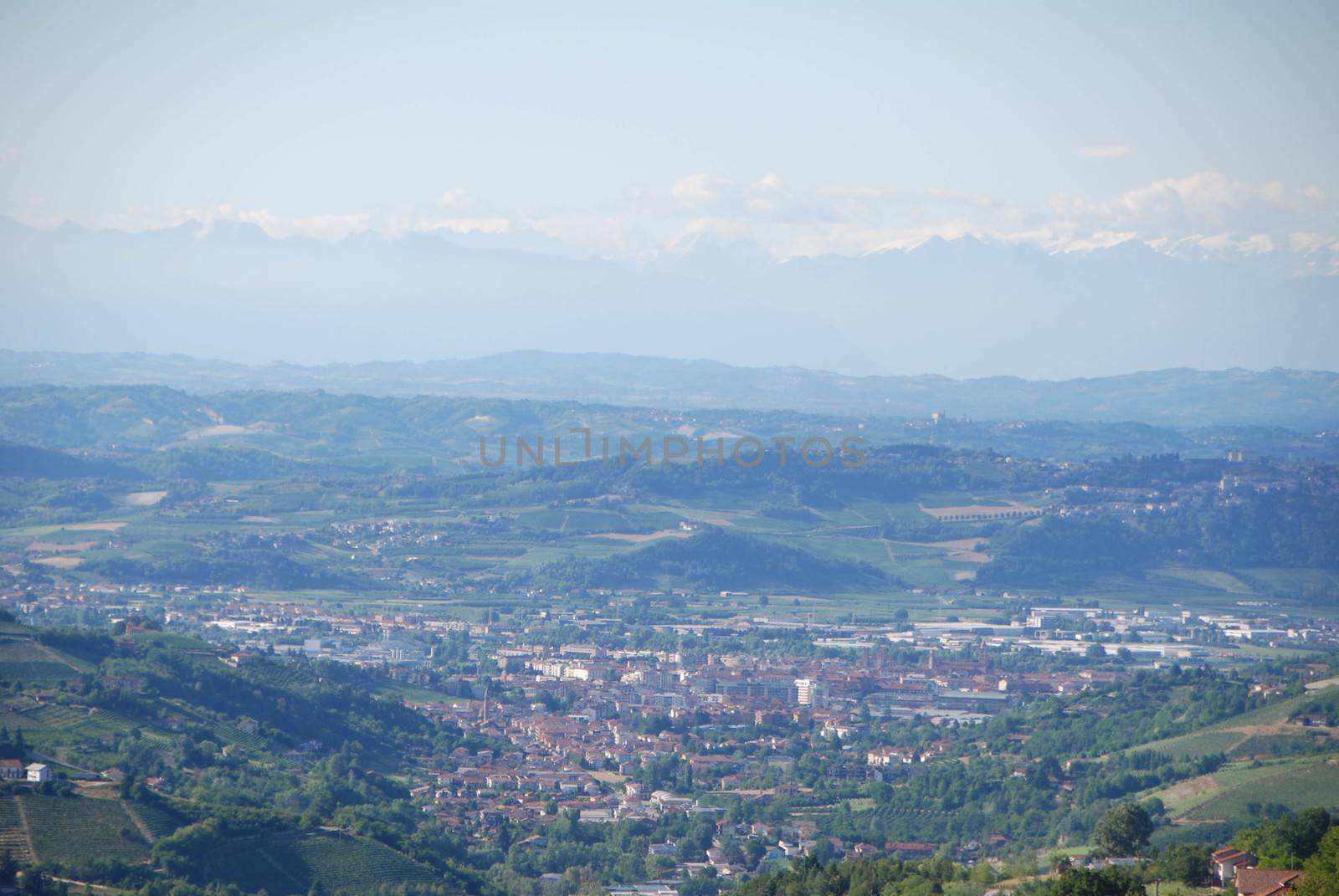 Cityscape of Alba and Langhe hills by cosca
