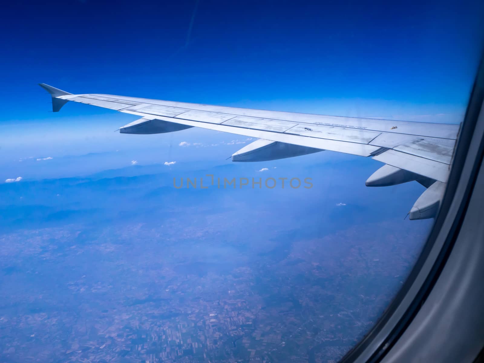 The looking at aircraft wing view from windows